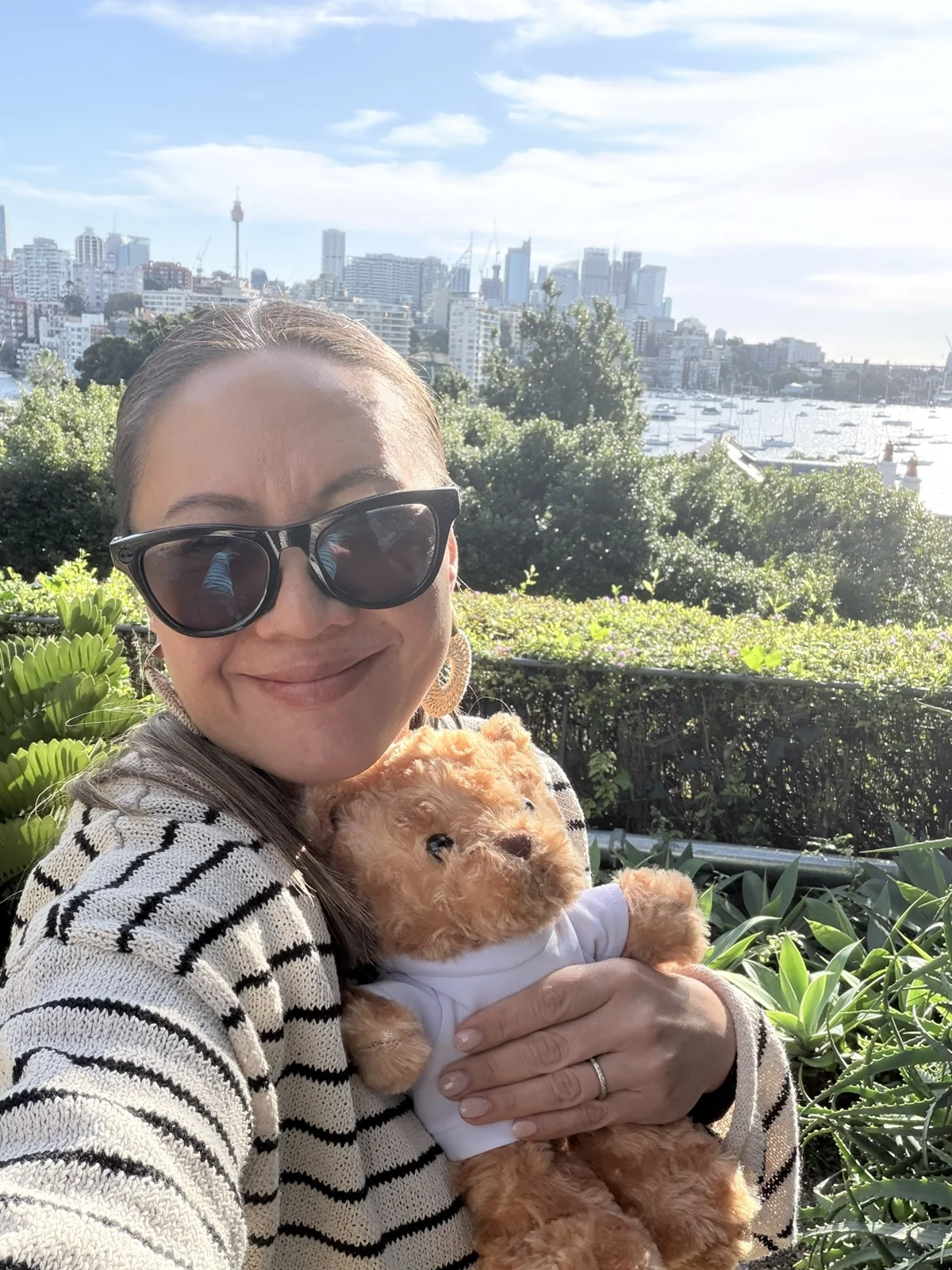 Melody holding the eUmeco teddy at Darling Point